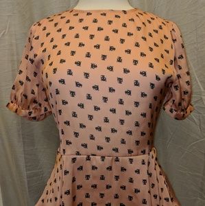 Orange chococat print blouse.